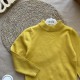 Дитячий в'язаний гольф гірчичний