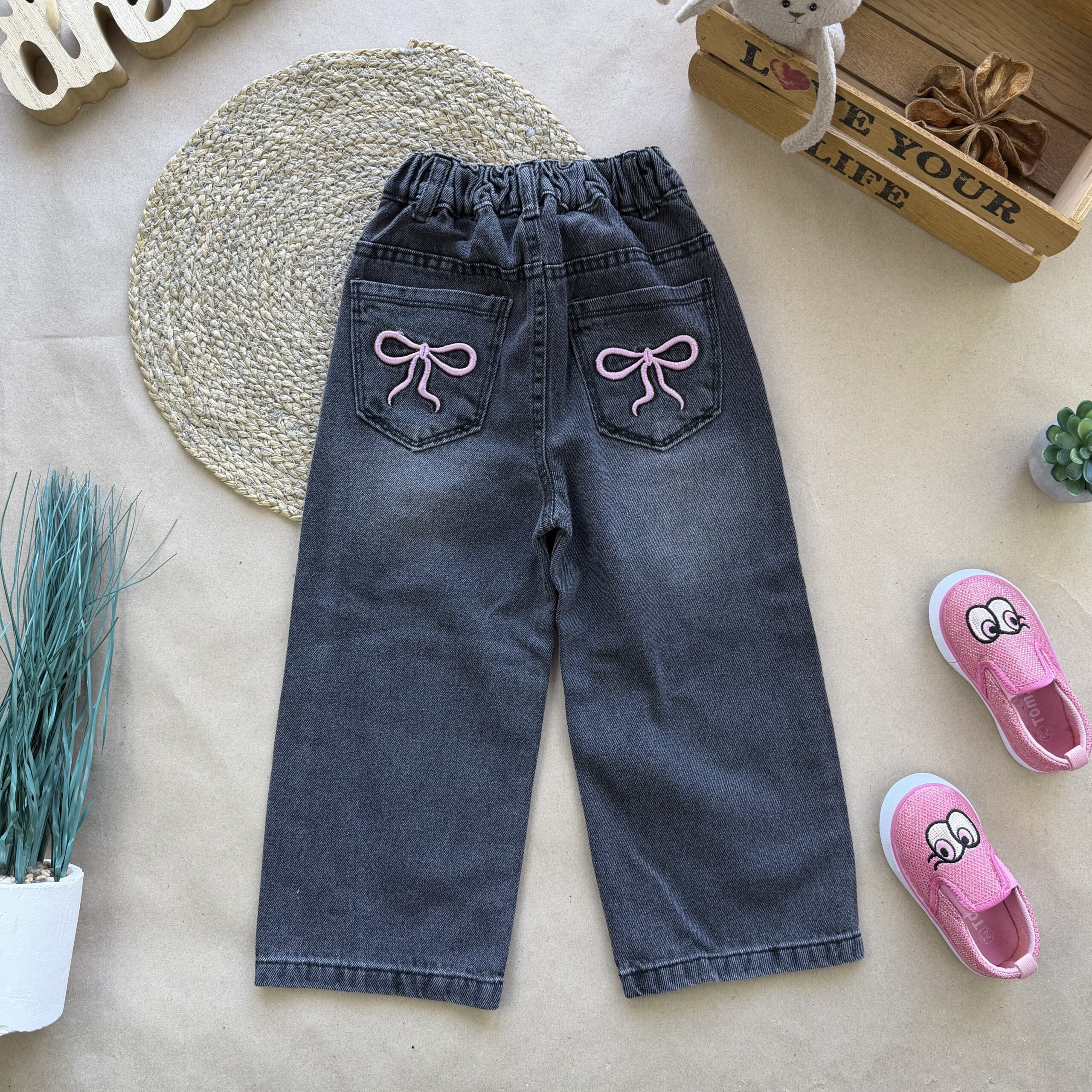 Джинси рожеві бантики