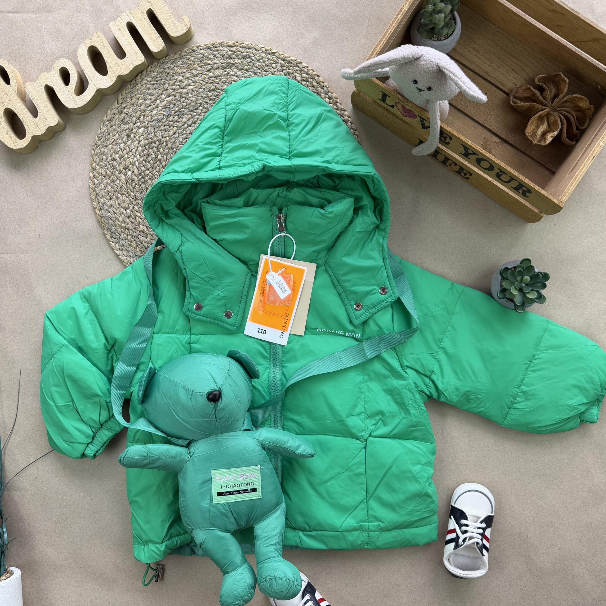 Куртка з іграшкою