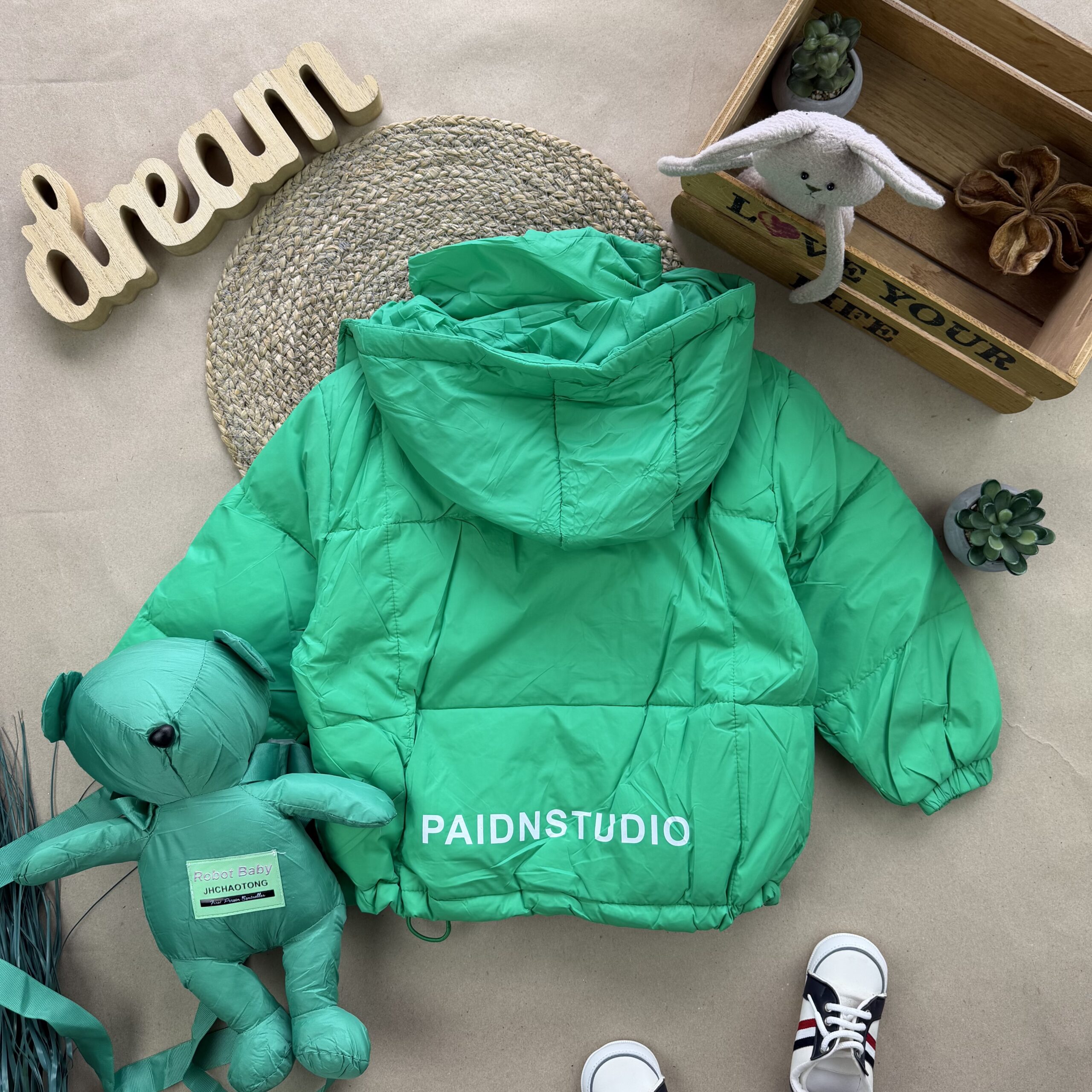 Куртка з іграшкою