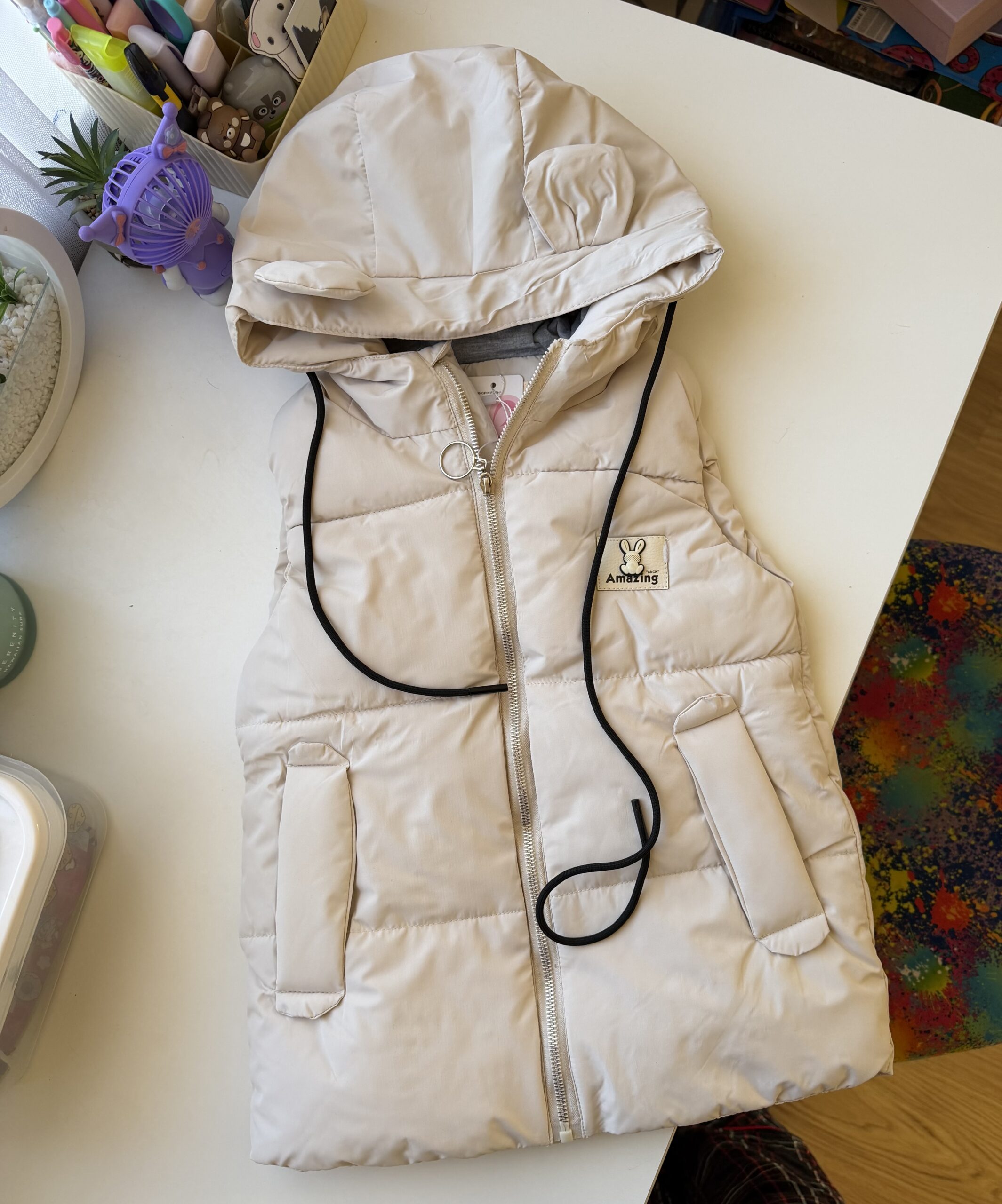 Жилет вушка молочний