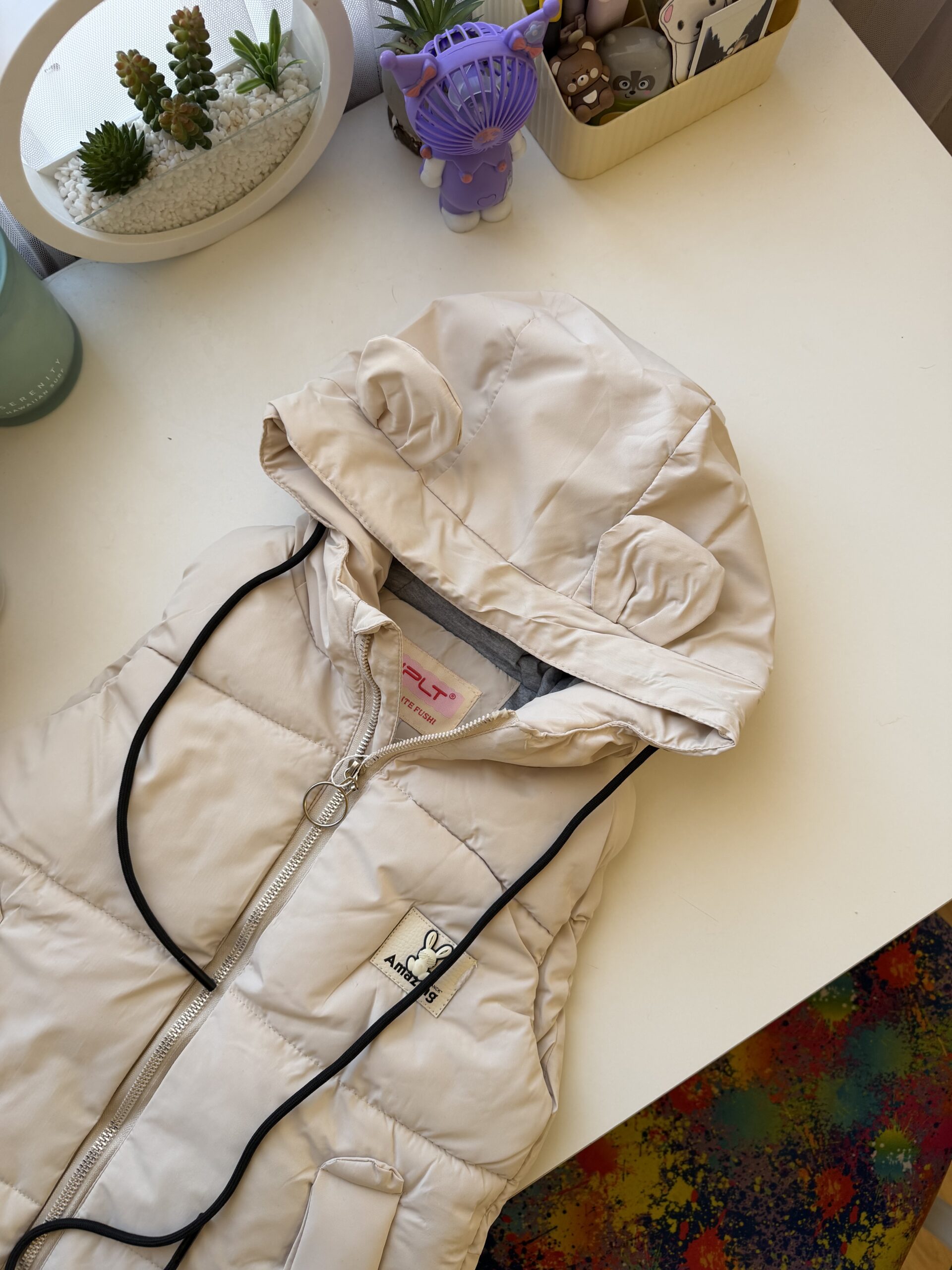 Жилет вушка молочний