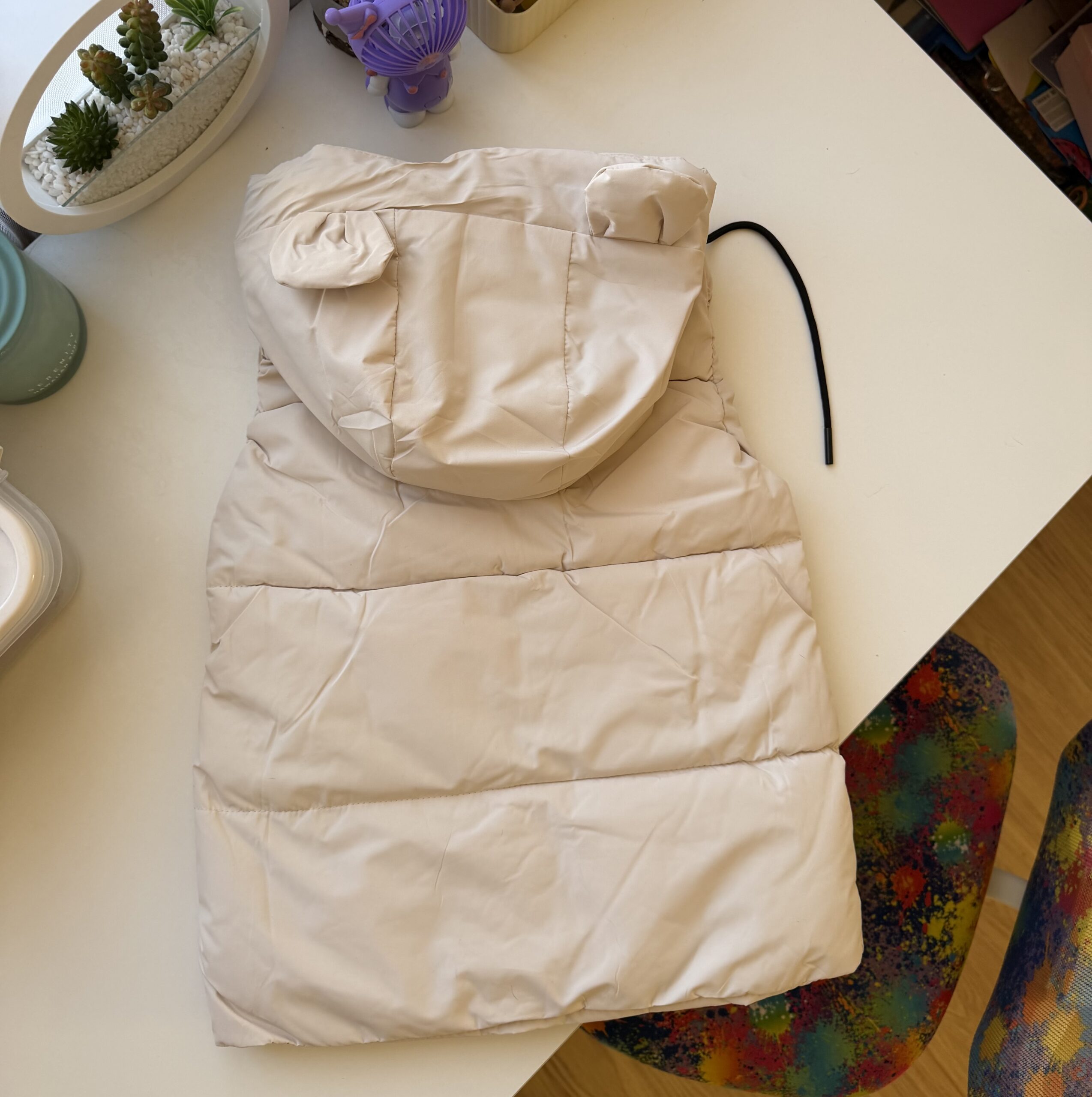 Жилет вушка молочний