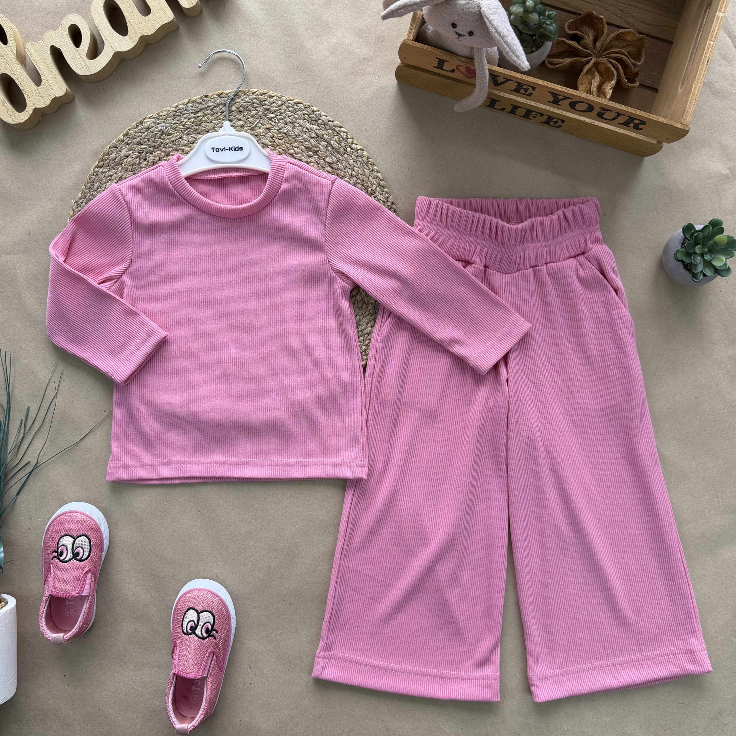 Відшивається. костюм з палаццо рубчик рожевий