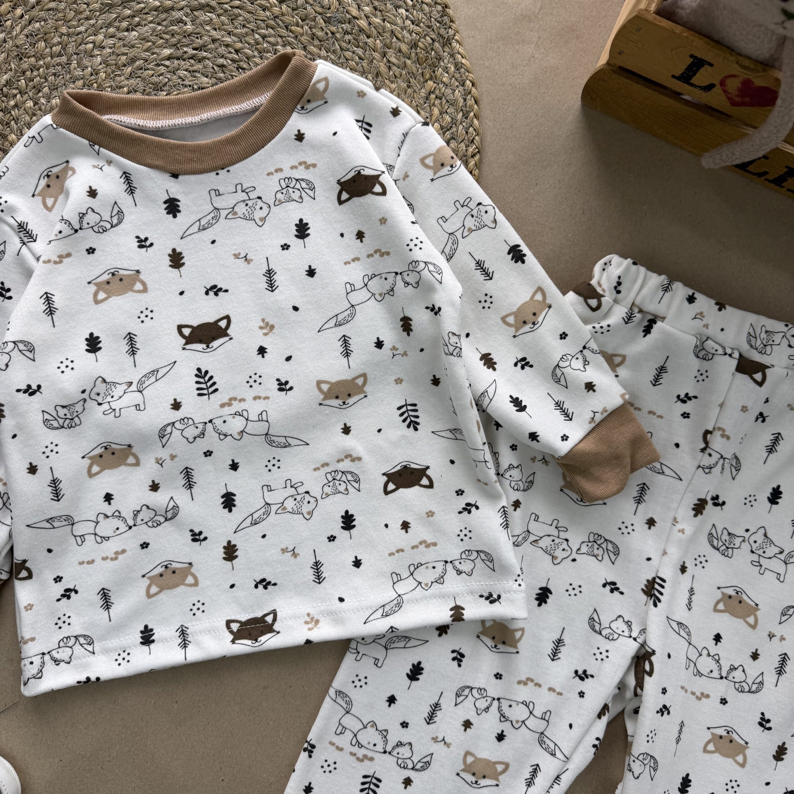 Відшивається. Піжама інтерлок лисенята